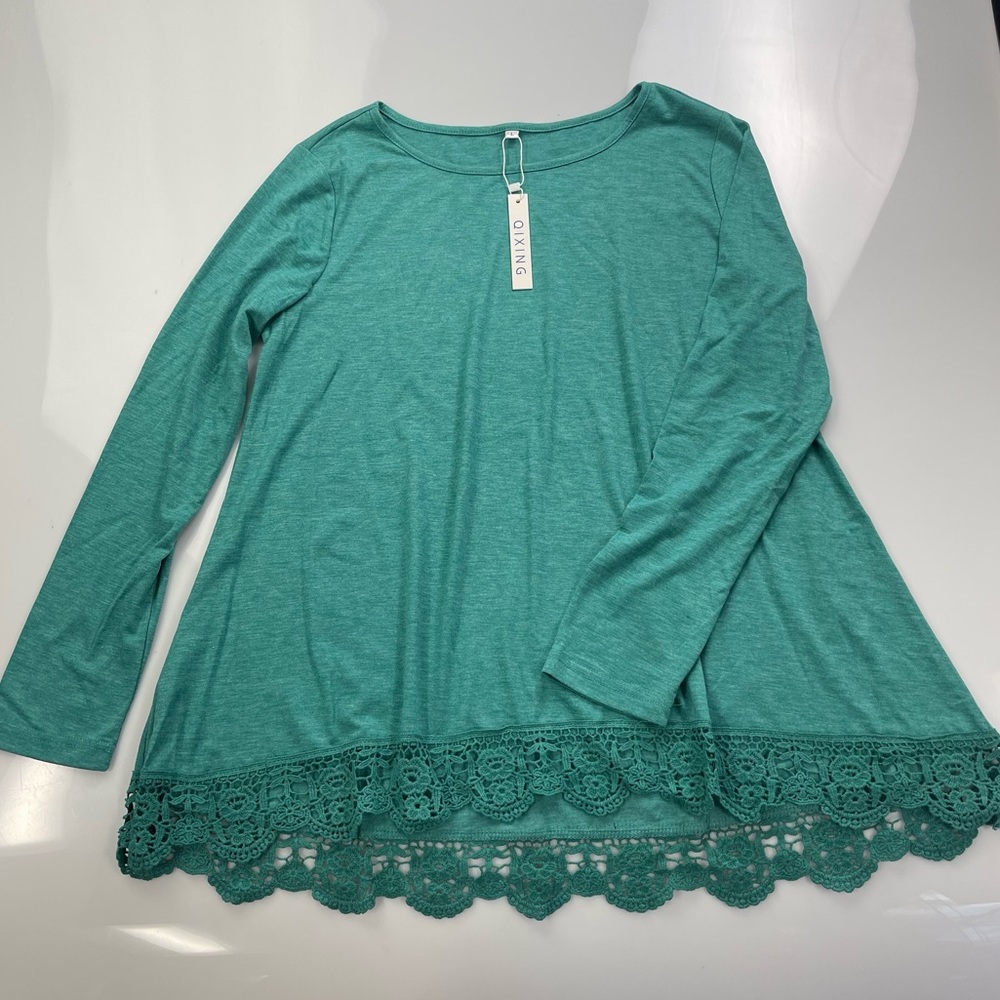 QIXING woman’s blouse size L